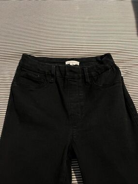 Good American jeans size M. Bootcut with the hem fringed.